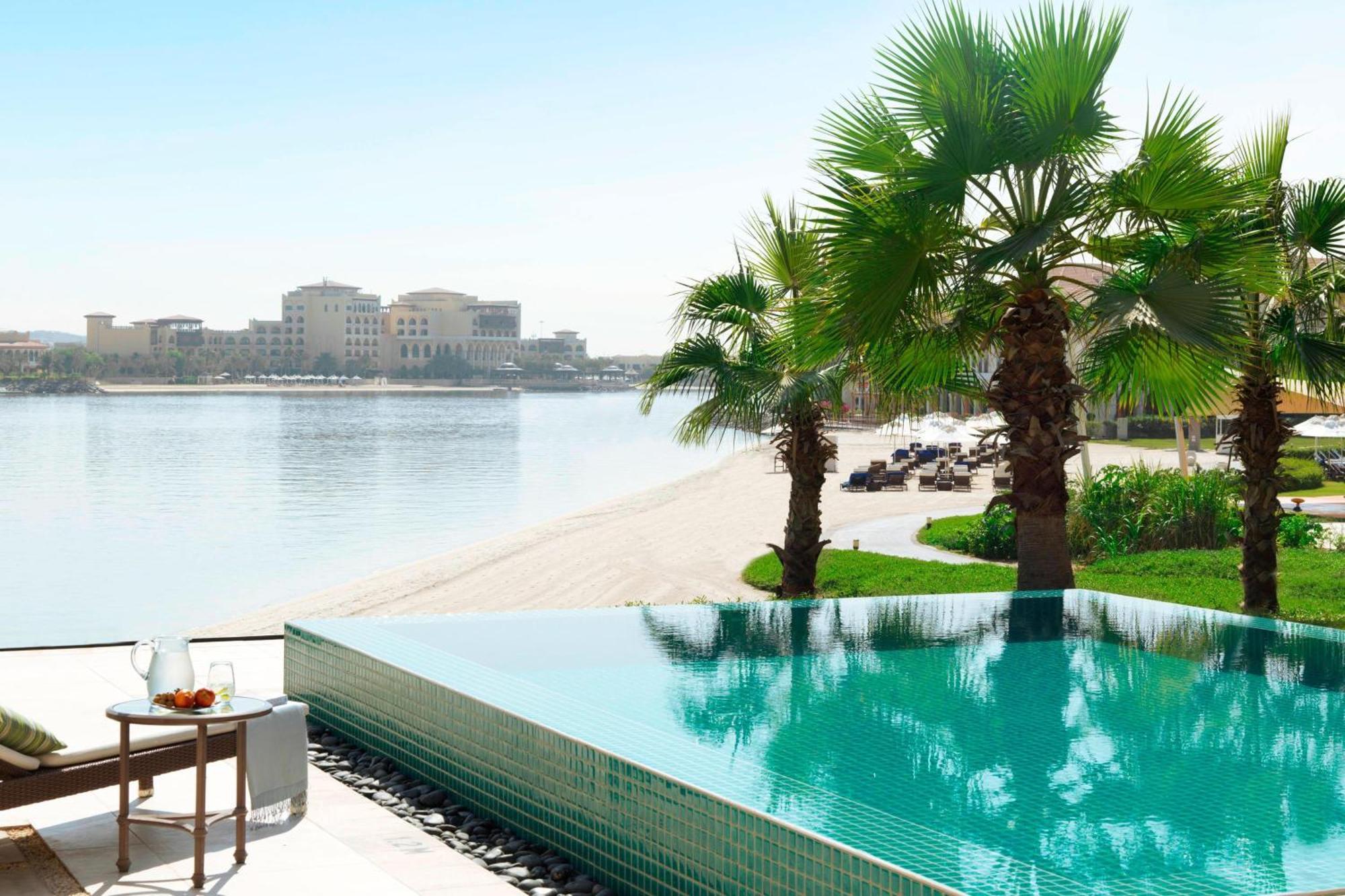 The Ritz-Carlton Abu Dhabi, Grand Canal Exterior photo View of the pool at the Jumeirah Beach Hotel