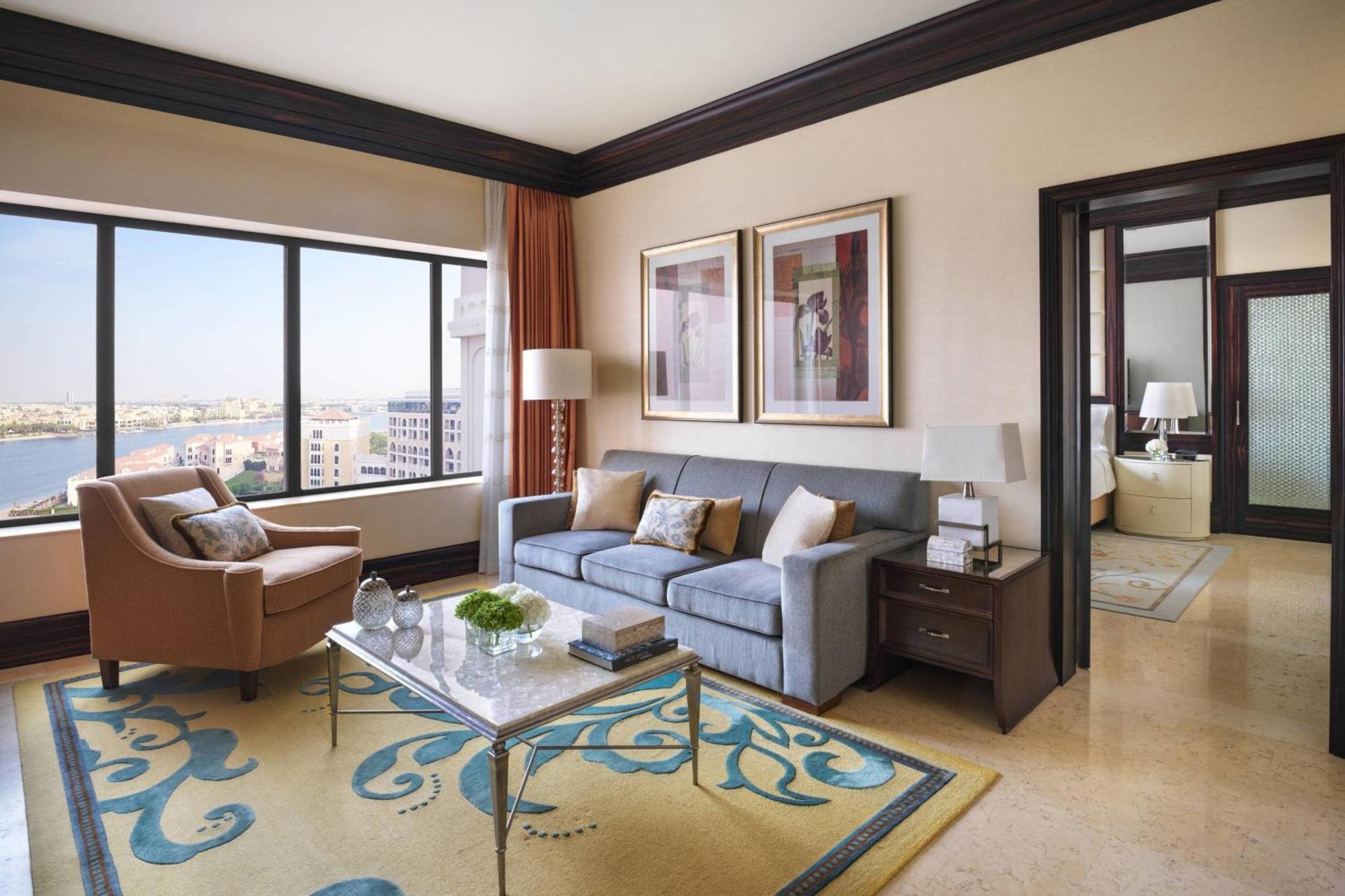 The Ritz-Carlton Abu Dhabi, Grand Canal Exterior photo A living room at the Four Seasons Hotel