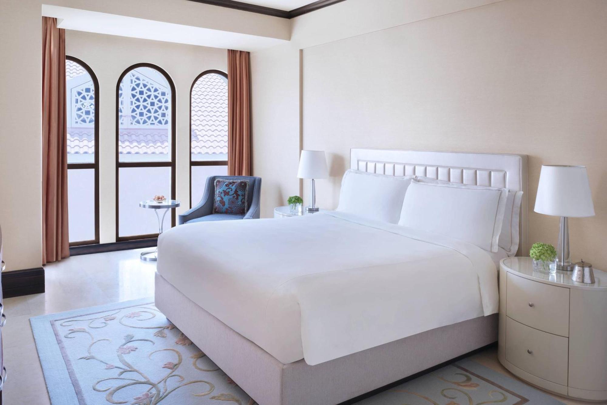 The Ritz-Carlton Abu Dhabi, Grand Canal Exterior photo A bedroom at the Ritz-Carlton, The Palm, Dubai